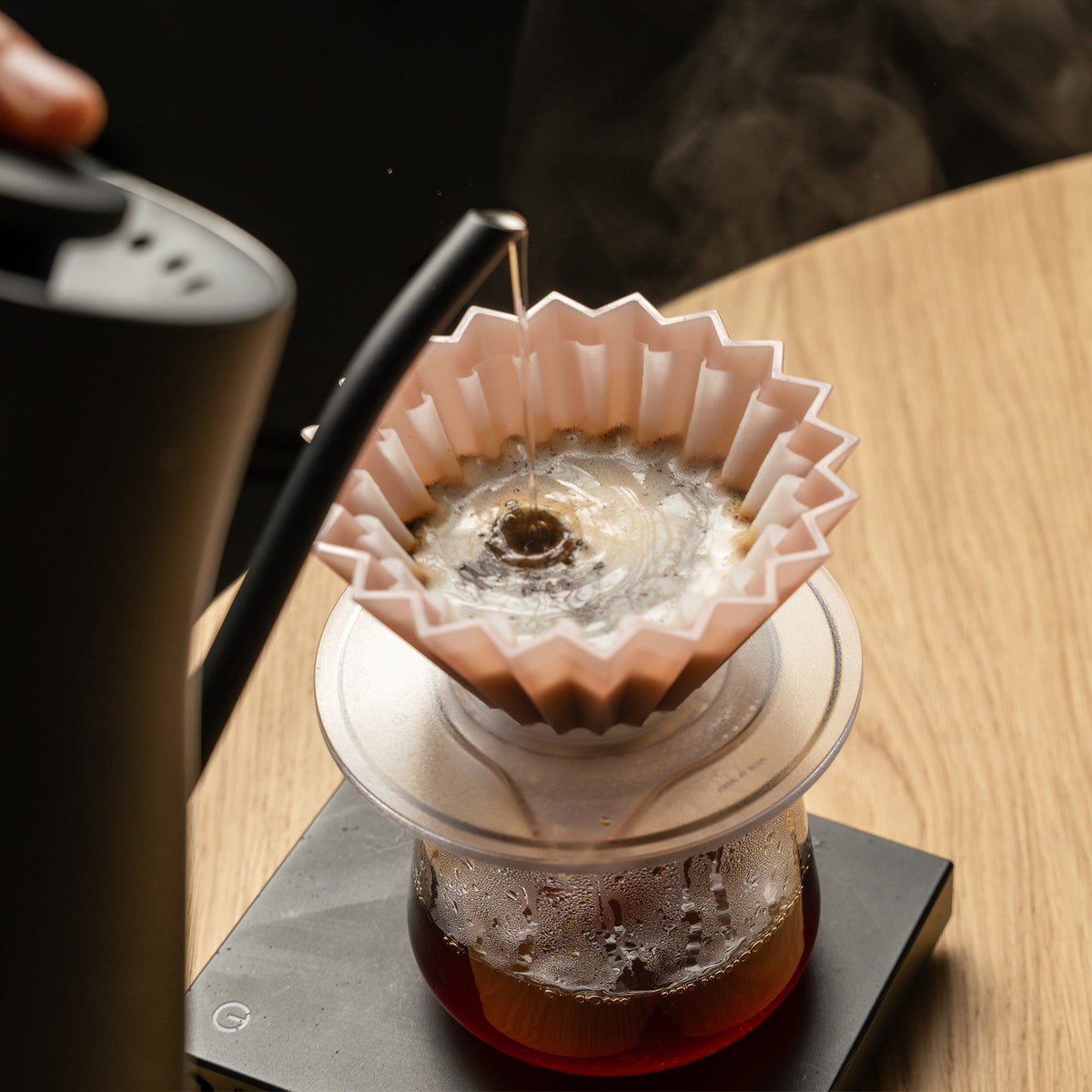 Pour-over brewing through a HiFlux wave filter in an ORIGAMI dripper