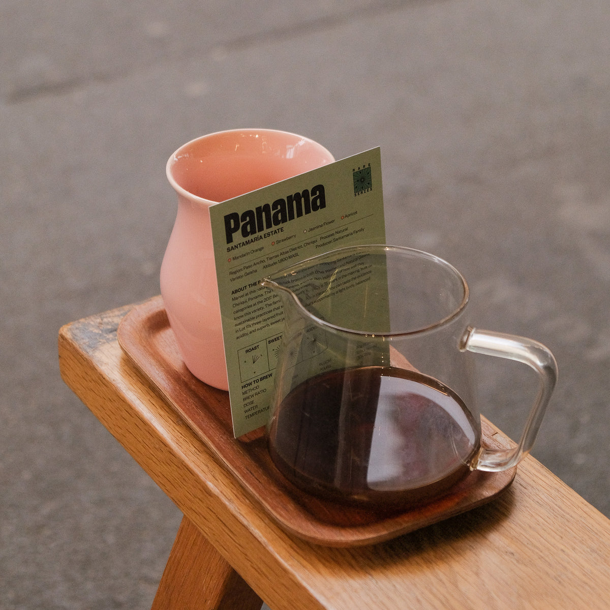Stitch Coffee RARE Series Panama Santamaria Estate info card with brewed filter coffee